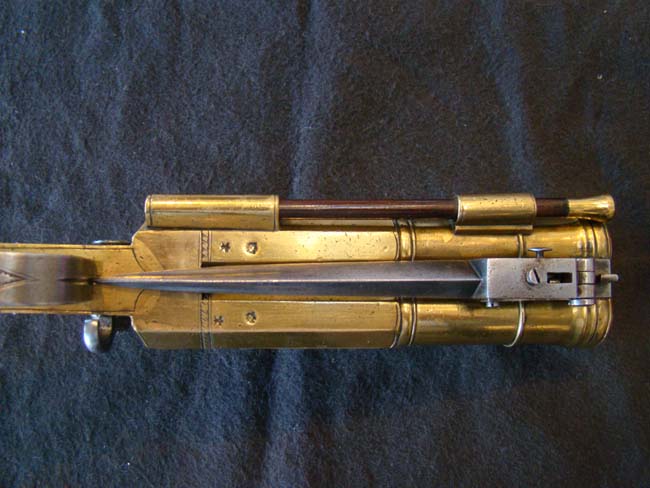 A RARE English Brass Double Cannon Barrel Flintlock Pistol with spring bayonet by Dawes, London, circa 1790. — image 4